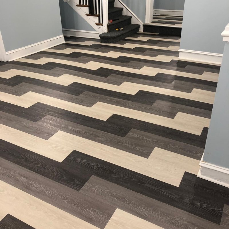 Creative Wood Flooring pattern in basement by Philadelphia flooring