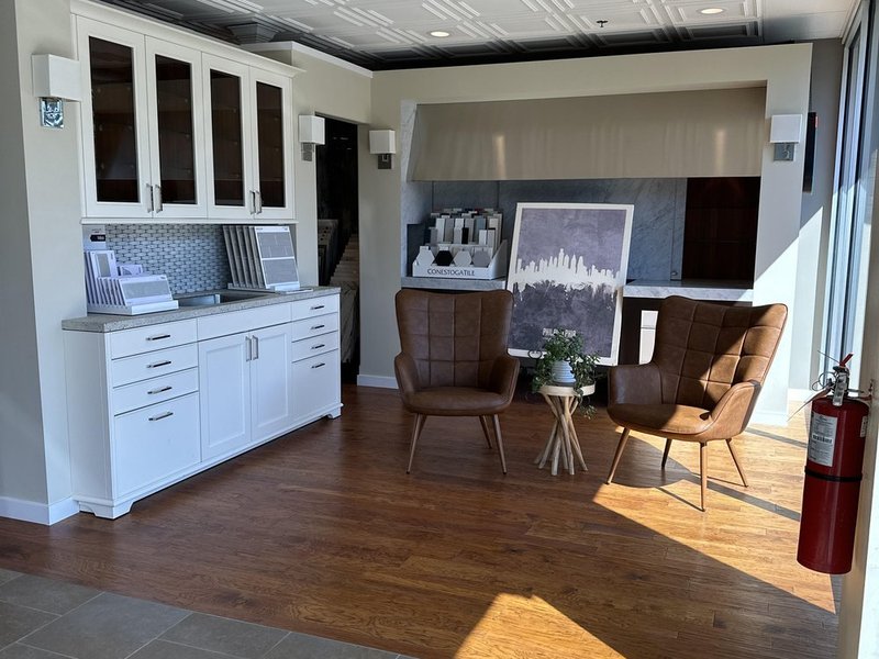 Customer looking at samples in a flooring Showroom